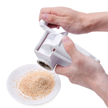 Manual cheese grater